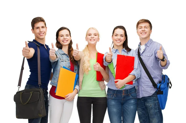 Group of smiling students showing thumbs up Stock Picture