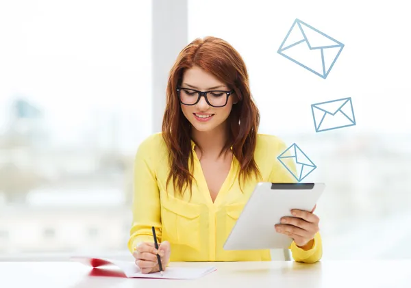 Student with tablet pc computer and notebook — Stock Photo, Image