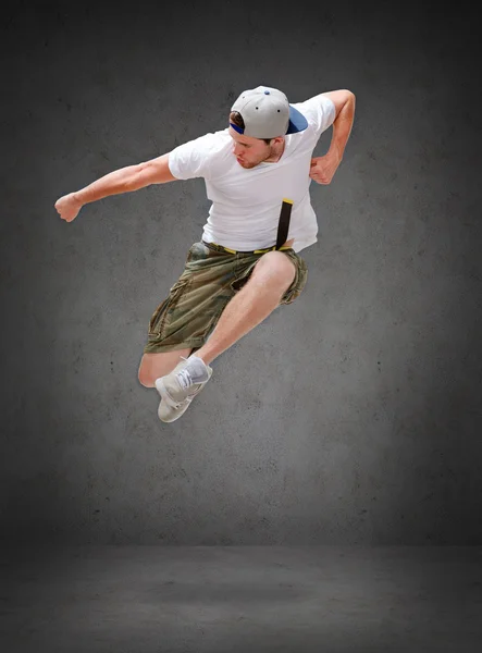 Male dancer jumping in the air Stock Photo