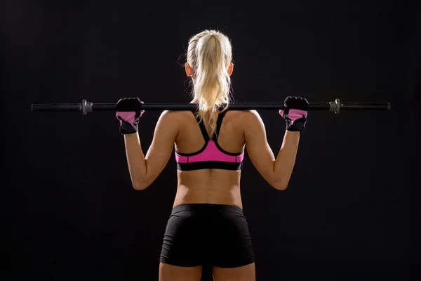 Mujer deportista haciendo ejercicio con barbell —  Fotos de Stock