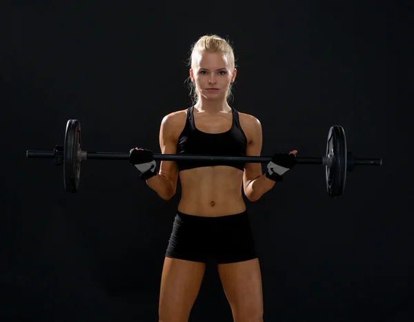 Mujer deportista haciendo ejercicio con barbell —  Fotos de Stock