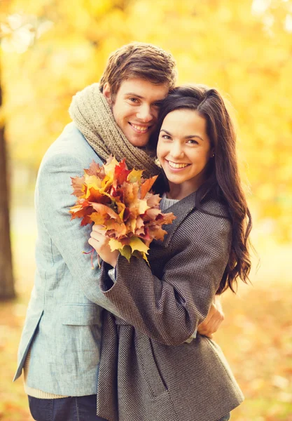 Romantic couple in the autumn park — Stock Photo, Image