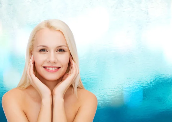 Face of beautiful woman touching her face skin — Stock Photo, Image