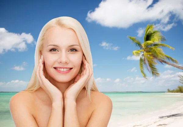 Face of beautiful woman touching her face skin — Stock Photo, Image