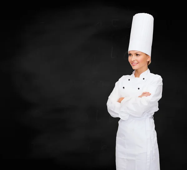 Ler kvinnliga kock med korsade armar — Stockfoto