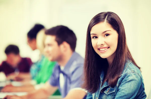 Student with computer studying at school — Stock Photo, Image