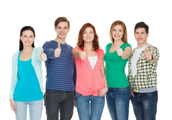 Grupo de estudantes sorrindo mostrando polegares para cima — Fotografia de Stock