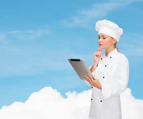 Smiling female chef with tablet pc computer — Stock Photo, Image