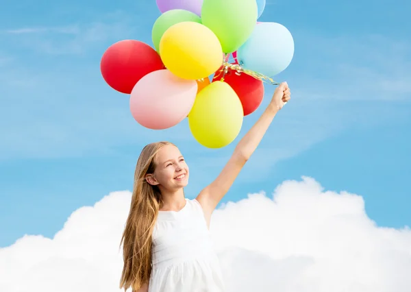 Chica feliz con globos de colores — Foto de Stock