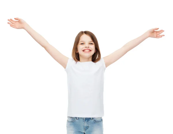 Smiling teenage girl with raised hands — Stock Photo, Image