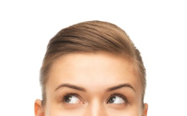 close up of beautiful female eyes looking up clipart