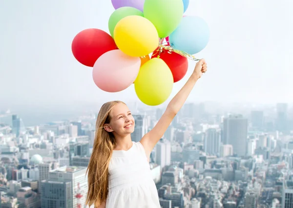 Chica feliz con globos de colores — Foto de Stock