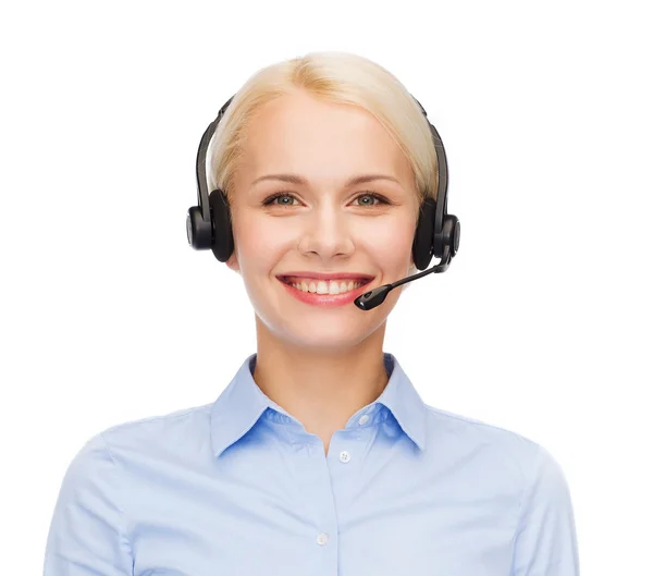 Amigable operador de línea de ayuda femenina con auriculares — Foto de Stock