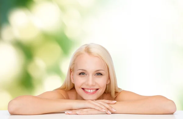 Clean face and shoulders of beautiful young woman Stock Picture