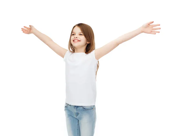 Smiling teenage girl with raised hands — Stock Photo, Image