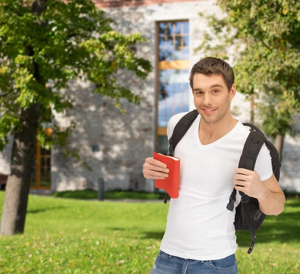 Student met rugzak en boek reizen — Stockfoto