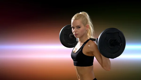 Mujer deportista haciendo ejercicio con barbell —  Fotos de Stock