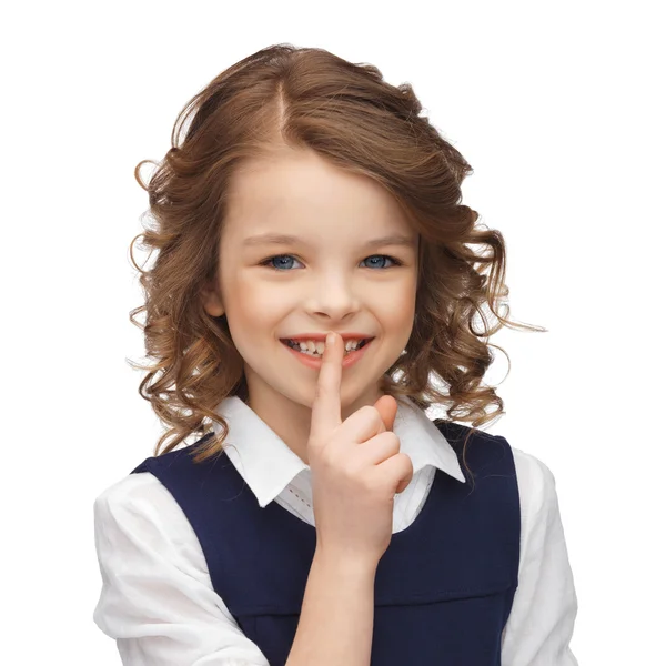 Menina pré-adolescente mostrando gesto silencioso — Fotografia de Stock