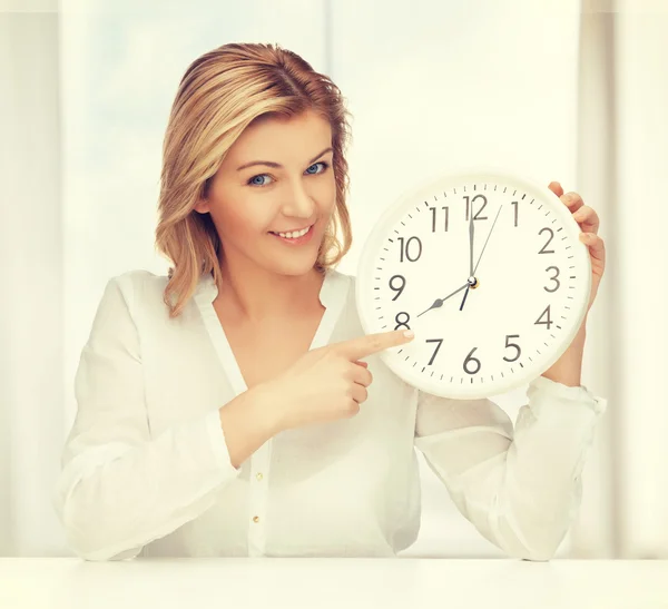 Woman with clock — Stock Photo, Image