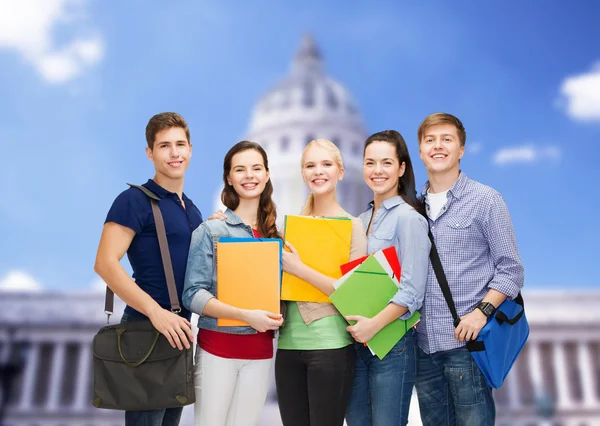 Group of smiling students standing — Stock Photo, Image