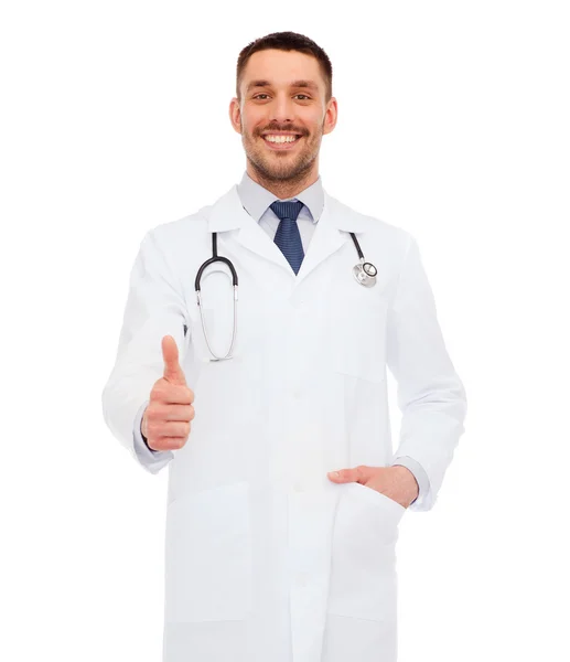 Smiling doctor with stethoscope showing thumbs up — Stock Photo, Image