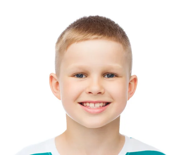 Smiling little boy over white background — Stock Photo, Image