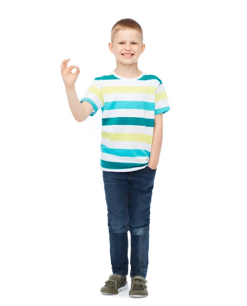 Little boy in casual clothes showing OK gesture — Stock Photo, Image