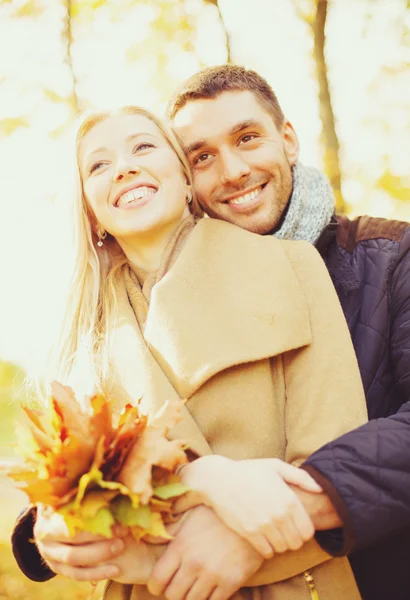 Romantic couple in the autumn park — Stock Photo, Image