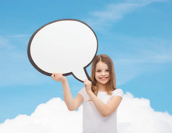 Smiling little girl with blank text bubble — Stock Photo, Image