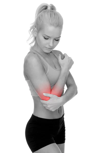 Sporty woman with pain in elbow — Stock Photo, Image