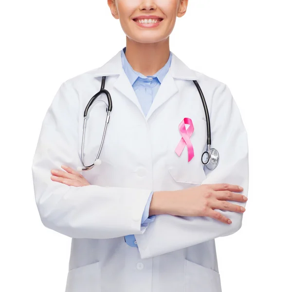 Female doctor with breast cancer awareness ribbon — Stock Photo, Image