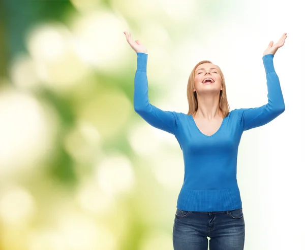 Laughing young woman waving hands — Stock Photo, Image