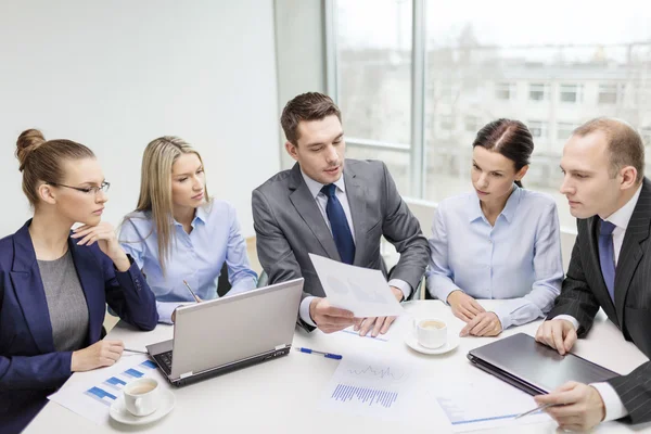 Business team with laptop having discussion — Stock Photo, Image