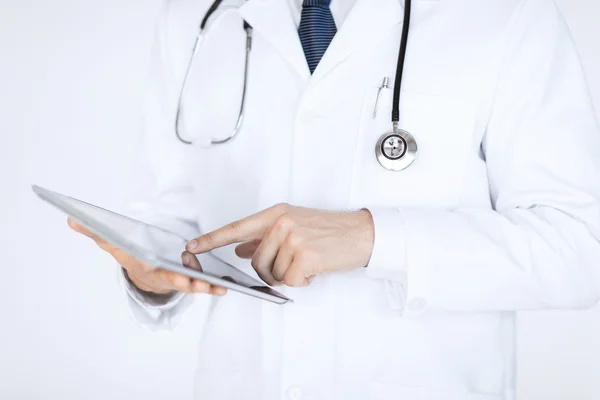 Male doctor holding tablet pc — Stock Photo, Image