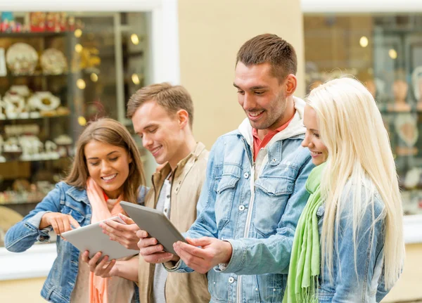 Group of smiling friends with tablet pc computers — Stock Photo, Image