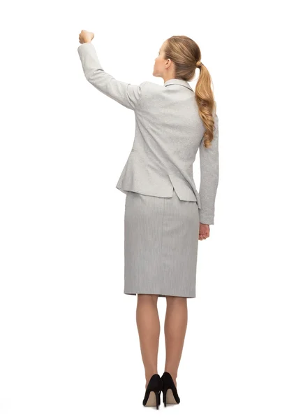 Businesswoman or teacher with marker from back — Stock Photo, Image