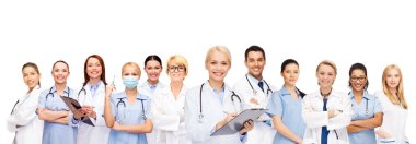 smiling female doctors and nurses with stethoscope clipart