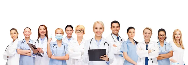 Smiling female doctors and nurses with stethoscope — Stock Photo, Image