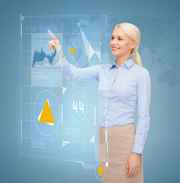 Smiling businesswoman working with virtual screen — Stock Photo, Image