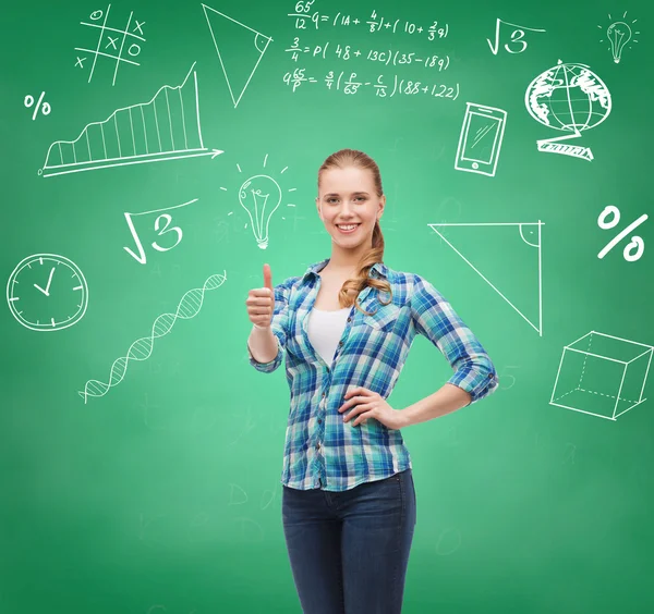 Sonriente estudiante chica mostrando pulgares hacia arriba —  Fotos de Stock