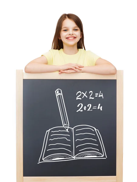 Gelukkig meisje met blackboard — Stockfoto