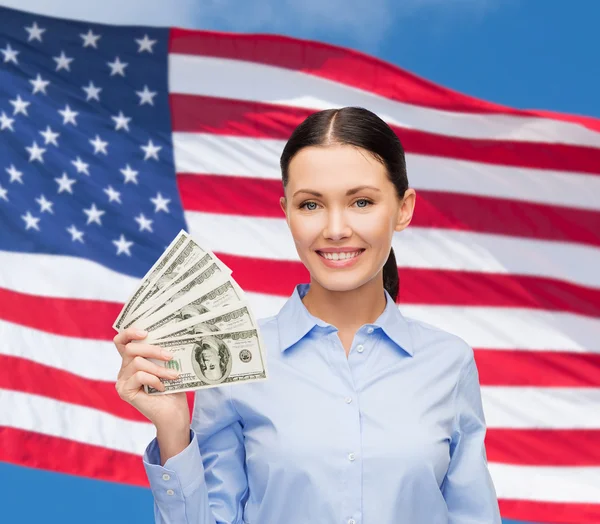 Geschäftsfrau mit Dollar-Bargeld — Stockfoto