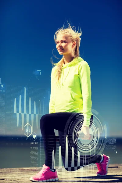 Sporty woman with light dumbbells outdoors — Stock Photo, Image