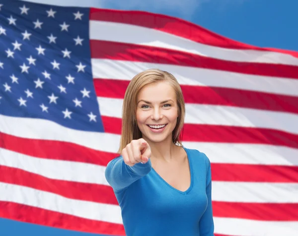 Smiling student pointing finger at you — Stock Photo, Image