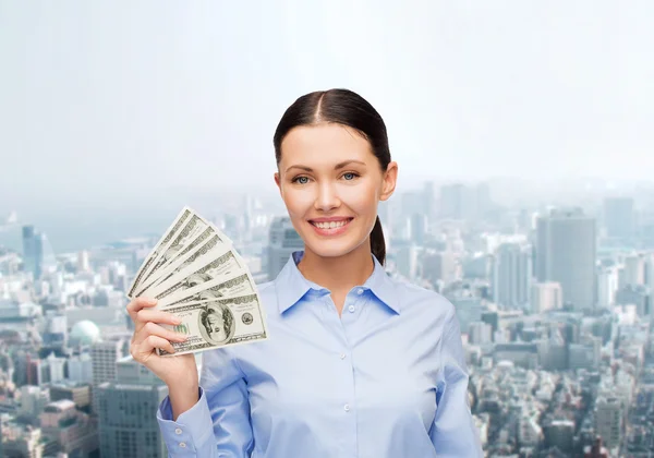 Zakenvrouw met dollar contant geld — Stockfoto
