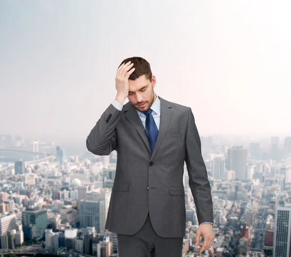 Handsome businessman having headache — Stock Photo, Image