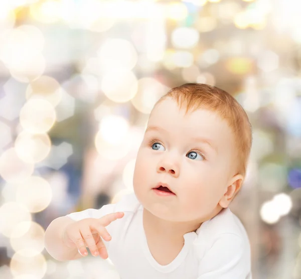 Curious baby looking side — Stock Photo, Image