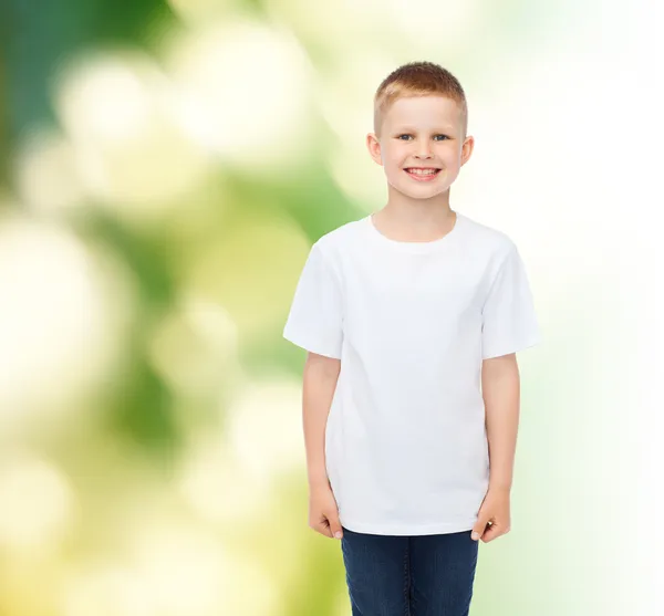 Smiling little boy in white blank t-shirt — Stock Photo, Image