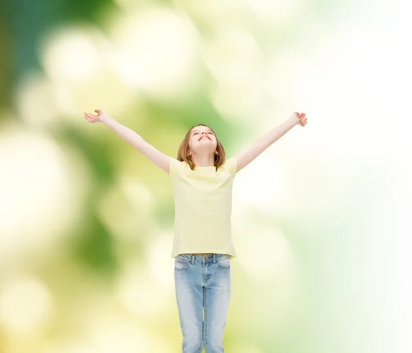 Smiling teenage girl with raised hands — Stock Photo, Image