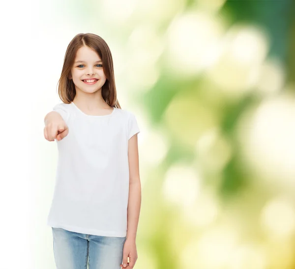 Smiling little girl in white blank t-shirt — Stock Photo, Image